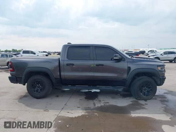 2021 Ram 1500 TRX with VIN 1C6SRFU95MN903481, listed as a IAAI auction lot 42971851 with 45,773 mi miles and . Bid and sale history available at DreamBid. Image 12.