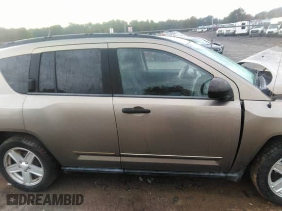 2008 Jeep Compass Sport with VIN 1J8FT47W58D616728, listed as a IAAI auction lot 43398564 with 121,179 mi miles and . Bid and sale history available at DreamBid. Image 13.