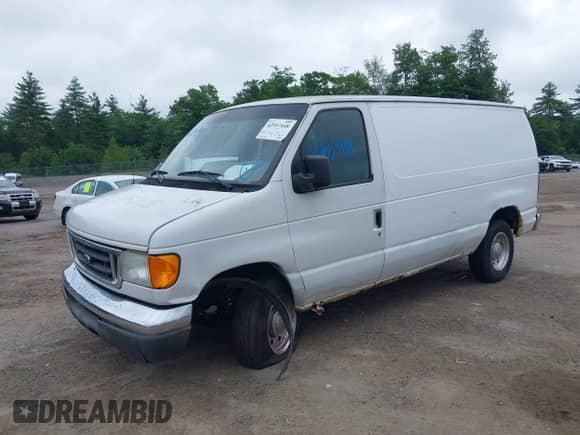 2006 Ford Econoline Cargo with VIN 1FTNE24L16HB43797, listed as a IAAI auction lot 42557448 with 230,514 mi miles and . Bid and sale history available at DreamBid. Image 2.