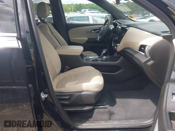 2023 Chevrolet Traverse LS with VIN 1GNERFKW9PJ319344, listed as a IAAI auction lot 42181237 with 33,760 mi miles and . Bid and sale history available at DreamBid. Image 5.