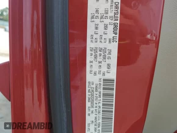 2013 Dodge Grand Caravan SE with VIN 2C4RDGBG5DR566505, listed as a Copart auction lot 59343265 with 211,519 mi miles and Salvage title. Bid and sale history available at DreamBid. Image 13.