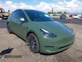 2023 Tesla Model Y Performance z VIN 7SAYGDEF2PF659649, wystawiony jako IAAI lot #43367901 z przebiegiem 38 943 mil mil oraz . Historia ofert i sprzedaży dostępna na DreamBid. Obrazek 1.