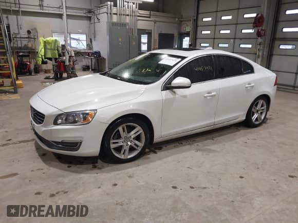 2015 Volvo S60 T5 Drive-E Premier with VIN YV126MFB4F1311693, listed as a IAAI auction lot 41457471 with 146,042 mi miles and . Bid and sale history available at DreamBid. Image 2.