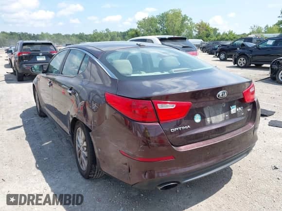 2014 Kia Optima LX with VIN 5XXGM4A7XEG344446, listed as a IAAI auction lot 42932567 with 241,322 mi miles and . Bid and sale history available at DreamBid. Image 3.