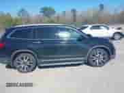 2021 Honda Pilot Touring 7-Passenger с VIN 5FNYF5H69MB034145, выставлен на аукционе IAAI как лот 41832468 с пробегом 85 008 миль миль и . История ставок и продаж доступна на DreamBid. Изображение 13.