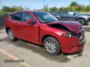 2024 Mazda CX-5 S Preferred z VIN JM3KFBCL7R0410162, wystawiony jako Copart lot #71776505 z przebiegiem 6 431 mil mil oraz Szkoda całkowita • Salvage title. Historia ofert i sprzedaży dostępna na DreamBid. Obrazek 4.