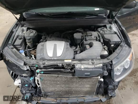 2012 Hyundai Santa Fe Limited с VIN 5XYZK4AG9CG148019, выставлен на аукционе Copart как лот 57613035 с пробегом 179 306 миль миль и На запчасти • Non repairable. История ставок и продаж доступна на DreamBid. Изображение 12.