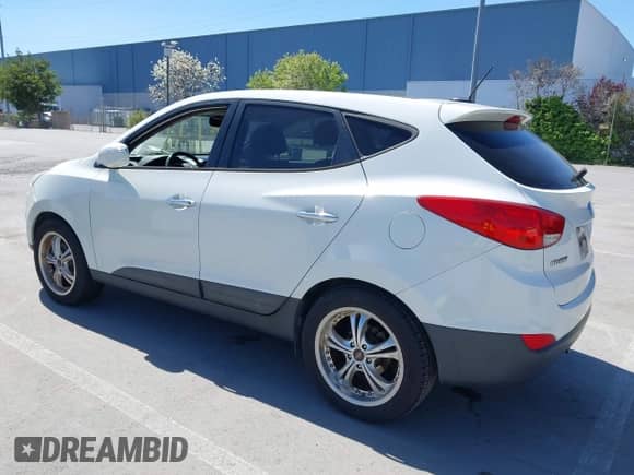 2012 Hyundai Tucson GLS with VIN KM8JU3AC9CU369869, listed as a IAAI auction lot 41997827 with 148,728 mi miles and . Bid and sale history available at DreamBid. Image 3.