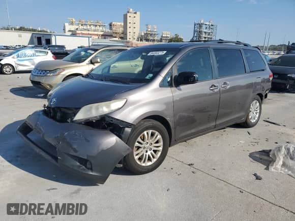 2012 Toyota Sienna XLE с VIN 5TDYK3DC8CS244970, выставлен на аукционе Copart как лот 84383275 с пробегом Не указан миль и Списание • Salvage title. История ставок и продаж доступна на DreamBid. Изображение 1.