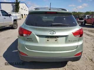 2012 Hyundai Tucson GLS z VIN KM8JU3AC7CU326017, wystawiony jako Copart lot #71749405 z przebiegiem 279 791 mil mil oraz Szkoda całkowita • Salvage title. Historia ofert i sprzedaży dostępna na DreamBid. Obrazek 6.