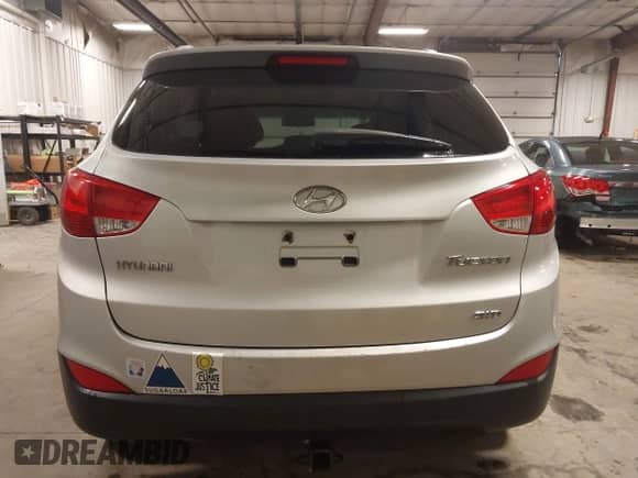 2010 Hyundai Tucson GLS with VIN KM8JUCAC9AU096445, listed as a IAAI auction lot 43294527 with 147,580 mi miles and . Bid and sale history available at DreamBid. Image 16.