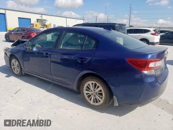 2018 Subaru Impreza Premium with VIN 4S3GKAB60J3613705, listed as a Copart auction lot 62088935 with 140,776 mi miles and Salvage title. Bid and sale history available at DreamBid. Image 2.
