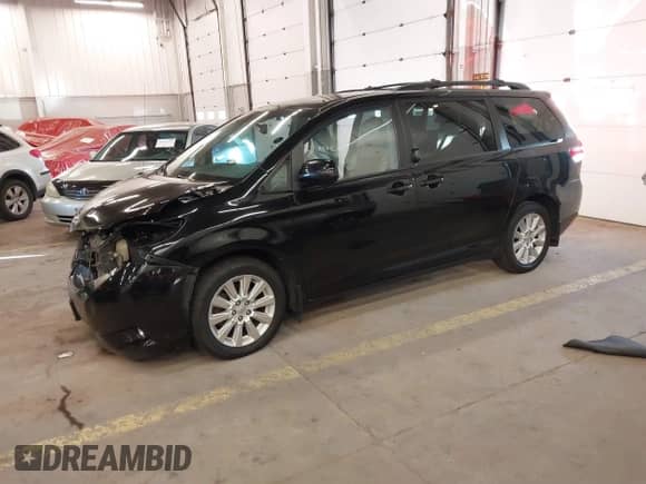 2013 Toyota Sienna LE with VIN 5TDJK3DC6DS067323, listed as a IAAI auction lot 41561998 with 188,643 mi miles and . Bid and sale history available at DreamBid. Image 21.