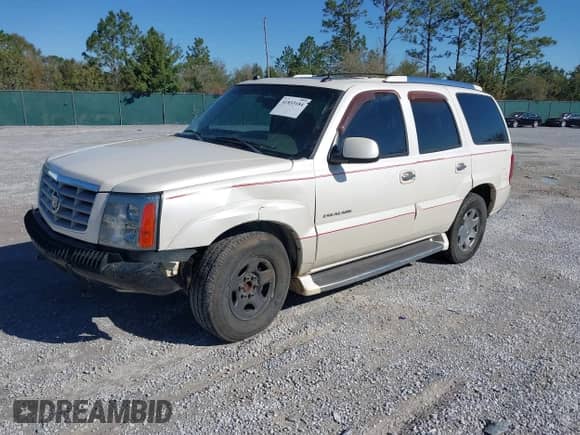 2004 Cadillac Escalade with VIN 1GYEC63TX4R299594, listed as a IAAI auction lot 41833184 with 320,822 mi miles and . Bid and sale history available at DreamBid. Image 2.
