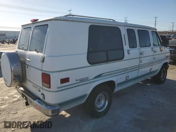 1994 Chevrolet Chevy Van с VIN 1GBEG25K9RF182710, выставлен на аукционе Copart как лот 79284544 с пробегом 178 640 миль миль и Чистый • Clean title. История ставок и продаж доступна на DreamBid. Изображение 3.