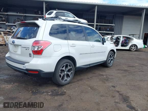2015 Subaru Forester XT Premium with VIN JF2SJGDC8FH587305, listed as a IAAI auction lot 42397546 with 61,323 mi miles and . Bid and sale history available at DreamBid. Image 4.