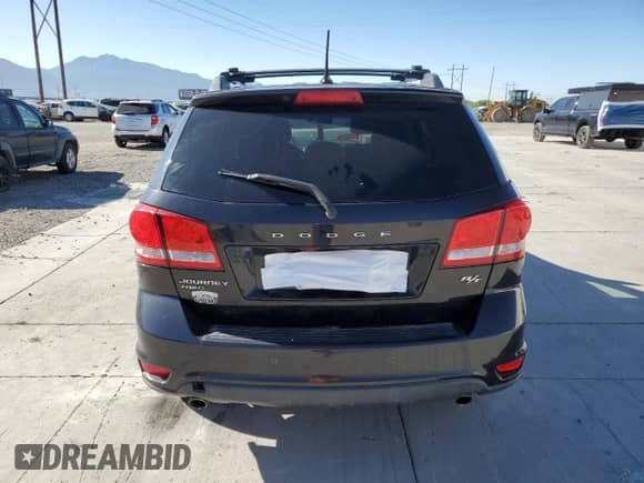 2012 Dodge Journey R/T with VIN 3C4PDDFG2CT215076, listed as a Copart auction lot 63874725 with 121,978 mi miles and Salvage title. Bid and sale history available at DreamBid. Image 6.