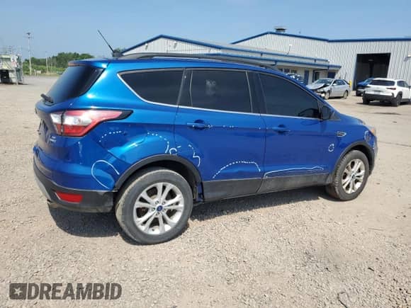 2018 Ford Escape SE с VIN 1FMCU9GD8JUC25299, выставлен на аукционе Copart как лот 65052085 с пробегом 101 263 миль миль и Чистый • Clean title. История ставок и продаж доступна на DreamBid. Изображение 3.