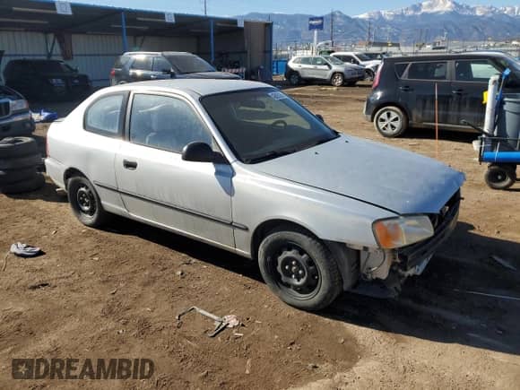 2002 Hyundai Accent z VIN KMHCF35G22U229645, wystawiony jako Copart lot #42605265 z przebiegiem 181 867 mil mil oraz Szkoda całkowita • Salvage title. Historia ofert i sprzedaży dostępna na DreamBid. Obrazek 4.