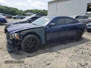 2013 Dodge Charger RT with VIN 2C3CDXCT0DH644894, listed as a Copart auction lot 61587215 with 184,467 mi miles and Salvage title. Bid and sale history available at DreamBid. Image 1.