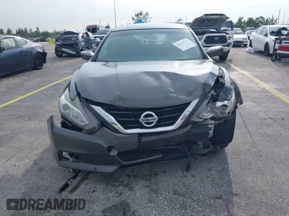 2016 Nissan Altima S with VIN 1N4AL3AP3GC242353, listed as a IAAI auction lot 43126215 with 129,494 mi miles and . Bid and sale history available at DreamBid. Image 6.
