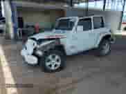 2020 Jeep Wrangler Sport S with VIN 1C4GJXAG8LW236820, listed as a Copart auction lot 63528545 with 63,934 mi miles and Salvage title. Bid and sale history available at DreamBid. Image 1.