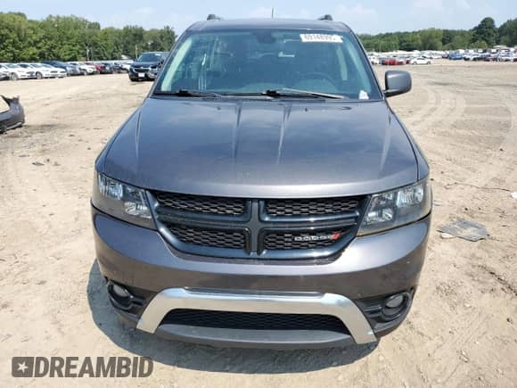 2020 Dodge Journey Crossroad with VIN 3C4PDCGB2LT213230, listed as a Copart auction lot 69148995 with 123,722 mi miles and Salvage title. Bid and sale history available at DreamBid. Image 5.