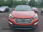 2015 Hyundai Santa Fe z VIN 5XYZUDLB4FG255365, wystawiony jako IAAI lot #42519572 z przebiegiem 64 472 mil mil oraz . Historia ofert i sprzedaży dostępna na DreamBid. Obrazek 6.