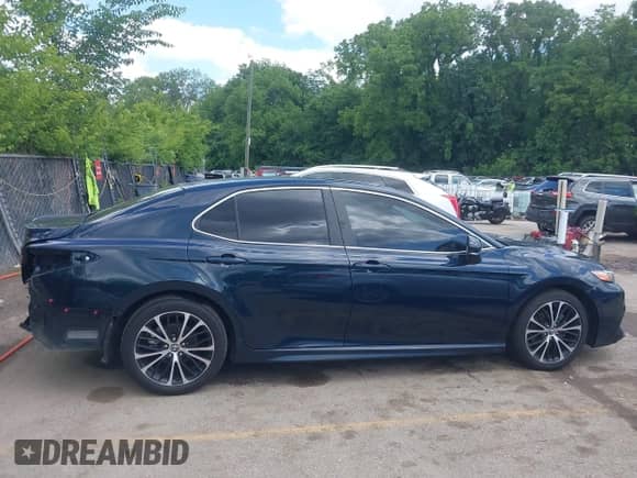 2020 Toyota Camry SE z VIN 4T1J11AK8LU935461, wystawiony jako IAAI lot #42354964 z przebiegiem 70 212 mil mil oraz . Historia ofert i sprzedaży dostępna na DreamBid. Obrazek 13.