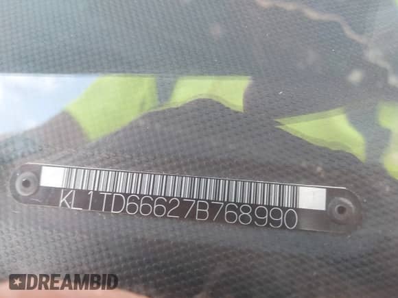 2007 Chevrolet Aveo LS с VIN KL1TD66627B768990, выставлен на аукционе IAAI как лот 42110025 с пробегом 63 822 миль миль и . История ставок и продаж доступна на DreamBid. Изображение 9.