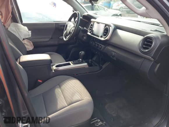 2021 Toyota Tacoma SR with VIN 3TMCZ5AN7MM383352, listed as a IAAI auction lot 43246296 with 44,937 mi miles and . Bid and sale history available at DreamBid. Image 5.
