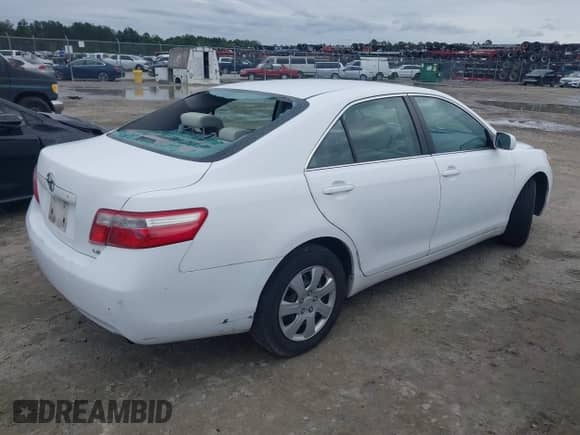 2007 Toyota Camry CE with VIN 4T1BE46K07U665019, listed as a IAAI auction lot 43400454 with 153,565 mi miles and . Bid and sale history available at DreamBid. Image 4.
