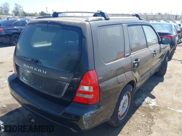 2004 Subaru Forester XT with VIN JF1SG69674H745243, listed as a IAAI auction lot 43200130 with 195,260 mi miles and . Bid and sale history available at DreamBid. Image 4.
