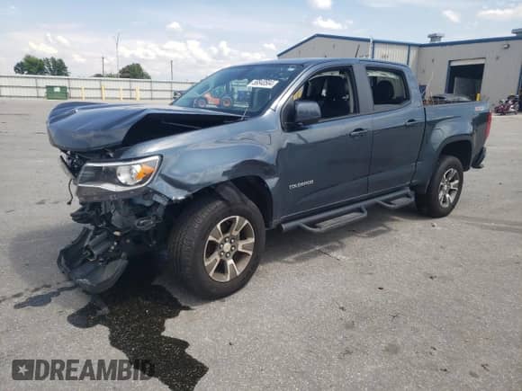2020 Chevrolet Colorado 4WD Z71 with VIN 1GCGTDEN1L1161201, listed as a Copart auction lot 58840584 with 60,456 mi miles and Salvage title. Bid and sale history available at DreamBid. Image 1.
