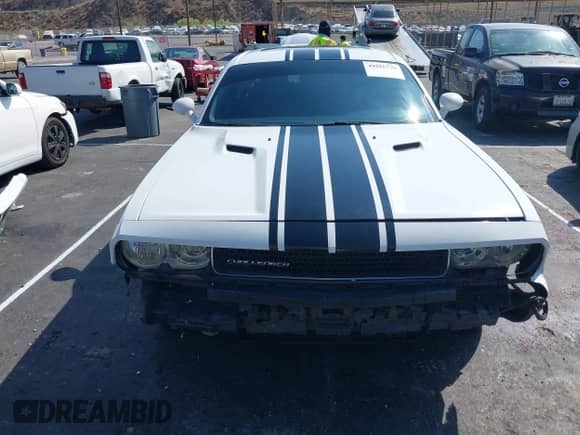 2013 Dodge Challenger SXT с VIN 2C3CDYAG0DH511936, выставлен на аукционе IAAI как лот 43316730 с пробегом 173 412 миль миль и . История ставок и продаж доступна на DreamBid. Изображение 13.