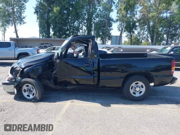 2000 Chevrolet Silverado 1500 LS with VIN 1GCEC14W7YZ147831, listed as a IAAI auction lot 42386307 with Not provided miles and . Bid and sale history available at DreamBid. Image 14.