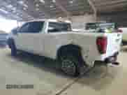 2023 GMC Sierra 1500 AT4 with VIN 3GTUUEE84PG109553, listed as a Copart auction lot 69766895 with 76,884 mi miles and Salvage title. Bid and sale history available at DreamBid. Image 2.