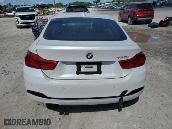 2018 BMW 4 Series 430i с VIN WBA4J1C50JBM11932, выставлен на аукционе Copart как лот 85300615 с пробегом 77 090 миль миль и Списание • Salvage title. История ставок и продаж доступна на DreamBid. Изображение 6.