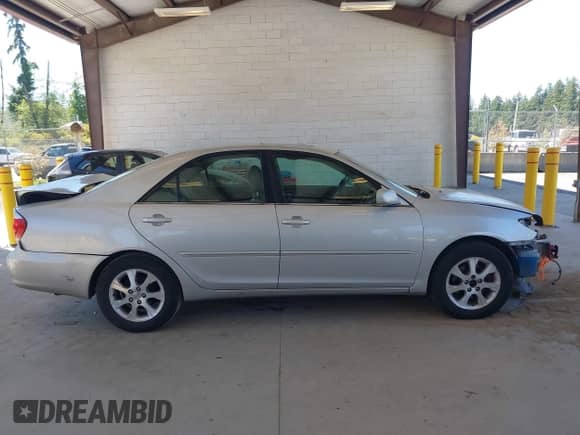 2005 Toyota Camry LE with VIN 4T1BF30K05U611555, listed as a IAAI auction lot 42349609 with 249,493 mi miles and . Bid and sale history available at DreamBid. Image 14.