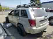 2009 Jeep Grand Cherokee Laredo with VIN 1J8GS48K29C503538, listed as a Copart auction lot 61381754 with 135,759 mi miles and Salvage title. Bid and sale history available at DreamBid. Image 2.