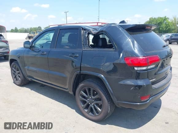 2019 Jeep Grand Cherokee Altitude with VIN 1C4RJFAG7KC606934, listed as a IAAI auction lot 42598576 with 69,916 mi miles and . Bid and sale history available at DreamBid. Image 3.