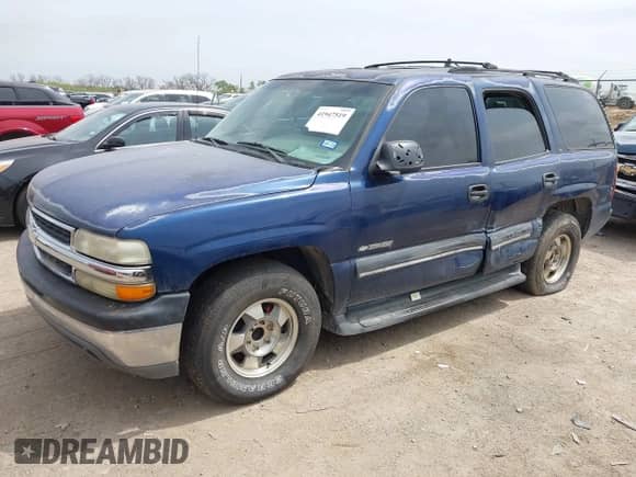 2000 Chevrolet Tahoe LS z VIN 1GNEC13T4YJ169931, wystawiony jako IAAI lot #41947519 z przebiegiem 227 868 mil mil oraz . Historia ofert i sprzedaży dostępna na DreamBid. Obrazek 2.