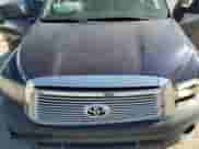 2012 Toyota Tundra z VIN 5TFRU5F17CX027376, wystawiony jako Copart lot #55213385 z przebiegiem 286 149 mil mil oraz Szkoda całkowita • Salvage title. Historia ofert i sprzedaży dostępna na DreamBid. Obrazek 11.