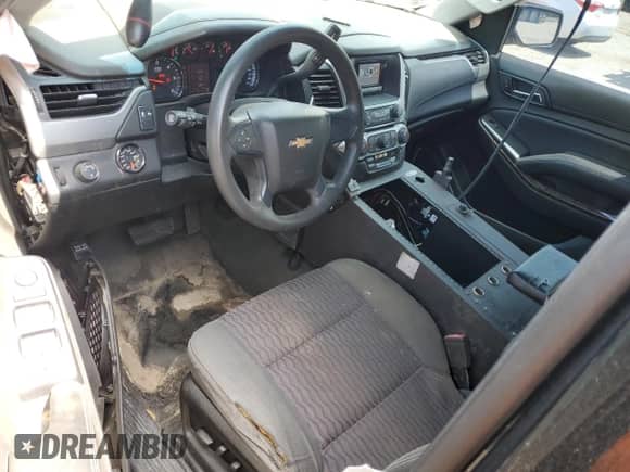 2015 Chevrolet Tahoe Commercial с VIN 1GNLC2EC8FR513897, выставлен на аукционе Copart как лот 69575935 с пробегом 122 512 миль миль и Списание • Salvage title. История ставок и продаж доступна на DreamBid. Изображение 8.
