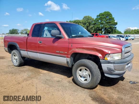 1999 Dodge 1500 with VIN 1B7HF13Z0XJ536971, listed as a Copart auction lot 84033895 with 174,678 mi miles and Salvage title. Bid and sale history available at DreamBid. Image 4.