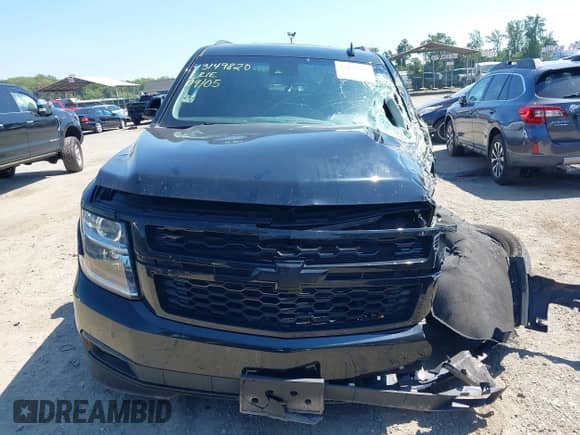 2018 Chevrolet Tahoe LT z VIN 1GNSKBKC9JR202765, wystawiony jako IAAI lot #43149820 z przebiegiem 79 113 mil mil oraz . Historia ofert i sprzedaży dostępna na DreamBid. Obrazek 18.