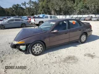 2000 Saturn LS with VIN 1G8JU52F3YY697730, listed as a Copart auction lot 83969324 with 176,491 mi miles and Salvage title. Bid and sale history available at DreamBid. Image 1.