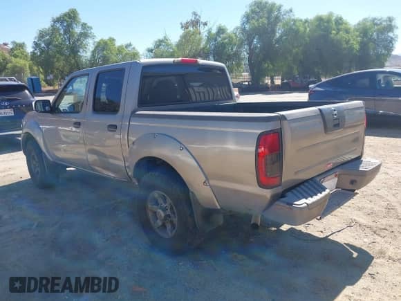 2004 Nissan Frontier XE with VIN 1N6ED27T14C447122, listed as a IAAI auction lot 43476223 with 239,991 mi miles and . Bid and sale history available at DreamBid. Image 3.
