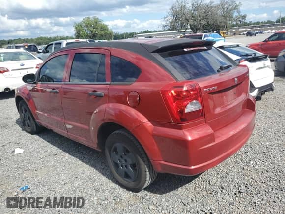 2009 Dodge Caliber SE with VIN 1B3HB28A69D258777, listed as a Copart auction lot 56851875 with 129,819 mi miles and Clean title. Bid and sale history available at DreamBid. Image 2.