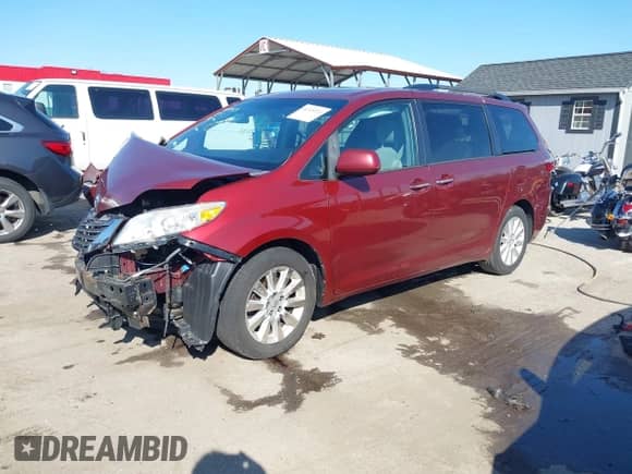 2015 Toyota Sienna Limited with VIN 5TDDK3DC0FS104012, listed as a IAAI auction lot 41935233 with 160,635 mi miles and . Bid and sale history available at DreamBid. Image 2.